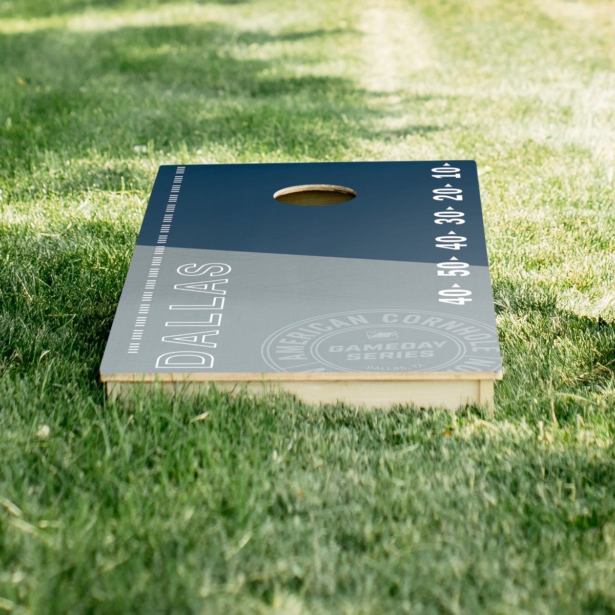 Premium wooden cornhole board with game day stadium graphics.