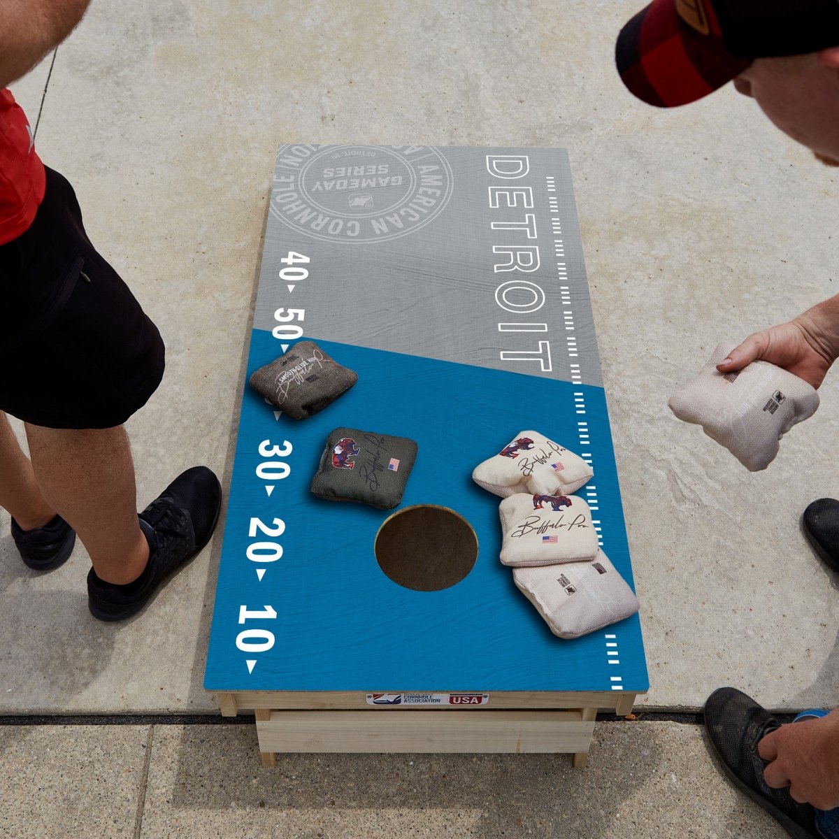 Premium wooden cornhole board with game day stadium graphics.